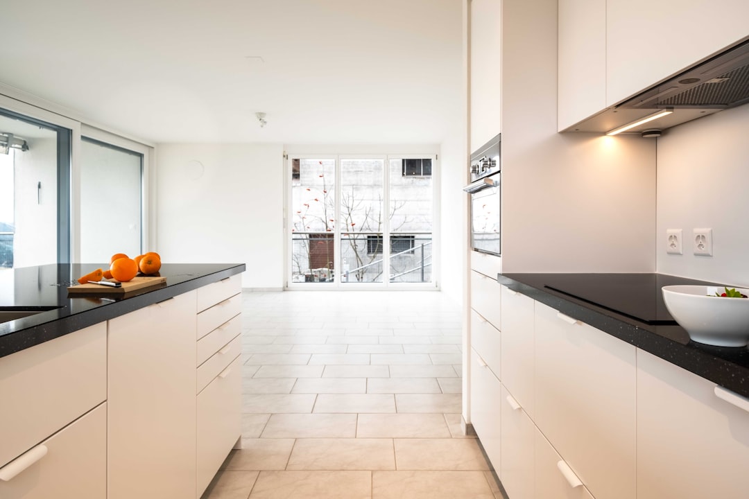 Kitchen IKEA black white orange fruits - Home Renovation by iR immo RENOVATION